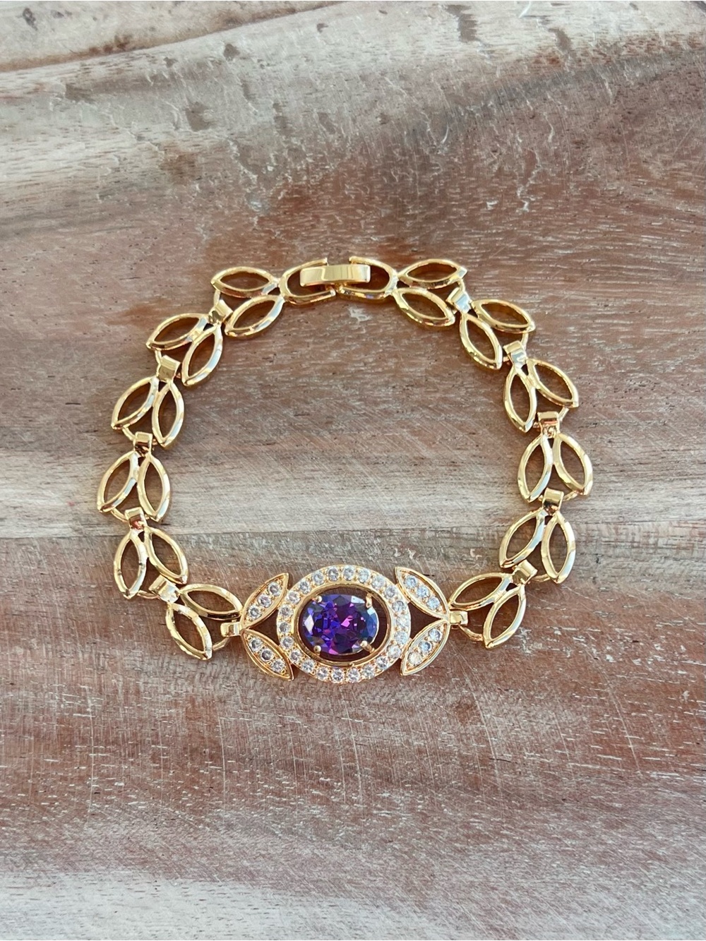 Gold Bracelet with Sparkly Purple Stone and Crystal Accents